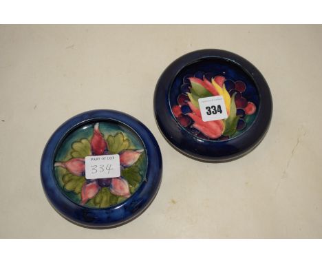 Two small Moorcroft ceramic dishes, signed to reverse W. Moorcroft, Potter to HM The Queen Made in England.