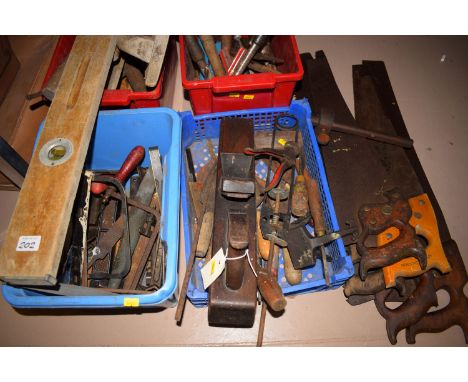 A collection of miscellaneous hand tools; saws; block planes; etc., in four boxes.