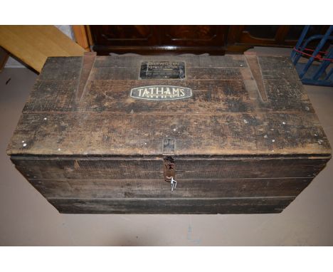 A large heavy duty wooden carpenter's trunk, with exterior hinges and padlock hasp, with metal labels inscribed 'Fibrewoven N