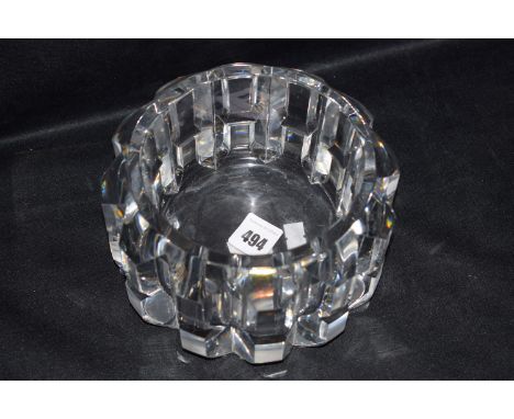 An Orrefors glass coaster.