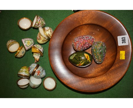 Three Halcyon Days Biltson & Battersea decorative enamelled eggs, with hinged metal mounts (one broken); together with four o