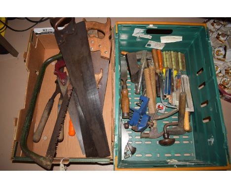 A collection of hand tools, including: chisels; hammers; saws; hinges; etc., in two boxes.