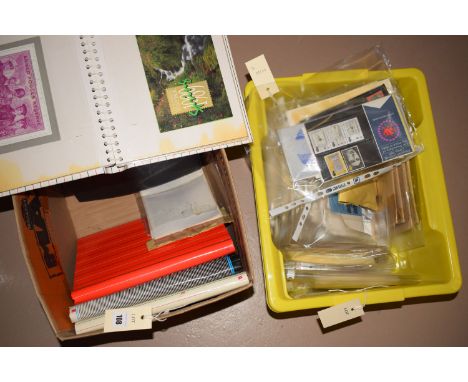 A large collection of first day covers in albums and in envelopes.