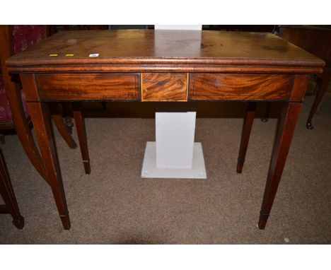 A 19th Century mahogany turnover top table, raised on square tapering legs.