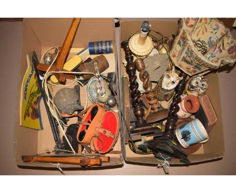 A selection of household sundries, in two boxes, including an oak table lamp and shade; spiral twist wooden candlesticks; bin