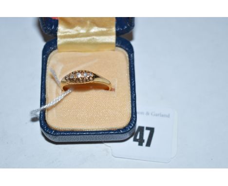 A five stone diamond ring, the old cut diamonds in pierced mount, on 18ct. yellow gold shank, ring size R.