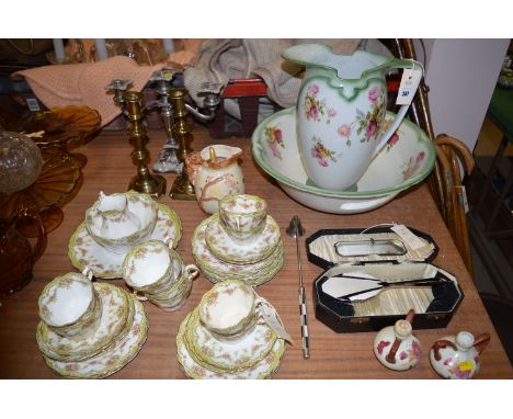 An early 20th Century Burleigh ware wash jug and bowl, decorated sprays of roses; together with an Art Deco brush and mirror;