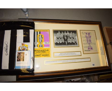 A Newcastle United replica shirt from the 1969 Fairs Cup, signed by twelve members of the Fairs Cup winning squad, with certi