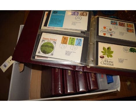A set of five albums of Royal Mail first day covers; and three other folders containing stamps and first day covers.