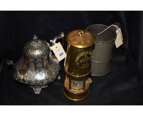 A modern Protector Lamp & Lighting Co. Type 6 M & Q miner's safety lamp; a pewter quart tankard inscribed A.A. Magpie; and a 