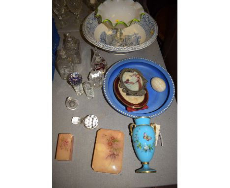 A blue and white wash bowl; a Victorian style opaque glass fruit stand with green rim and clear stem; a blue glass vase decor