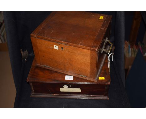 Two small mahogany table top coin cabinets fitted brass carrying handles.