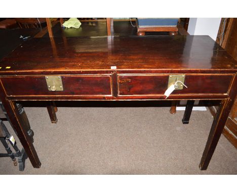 A Chinese rectangular stained wood alter table, with two shallow drawers to the frieze, raised on square legs.