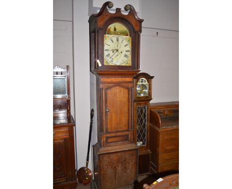 An early 19th Century longcase clock, the painted arched dial inscribed 'H. Armstrong, Alston', seconds subsidiary dials, the