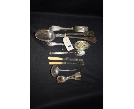 A quantity of electroplated cutlery, including: two basting spoons; a pair of strawberry pattern spoons; a small ladle; seven