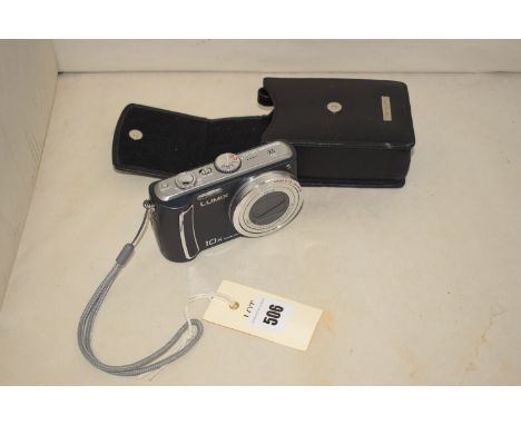 A Panasonic Lumix TZ4 digital compact camera; with accessories and original box.