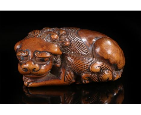 Japanese Edo period netsuke, carved in wood as Shishi, 5.5cm long