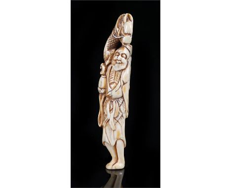 Japanese 18th Century ivory netsuke, of large proportions, carved as Gama Sennin, 12cm long