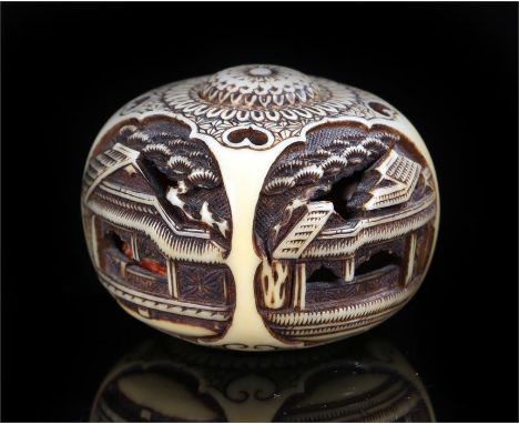 19th Century ivory Ryusa Manju netsuke pierced and carved with houses and pine trees 35mm diameter 