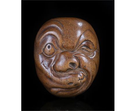 Mid 19th Century carved boxwood netsuke Kyogen mask of Usofuki 50mm high