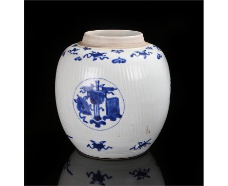 Chinese porcelain ginger jar of large proportions, possibly Kangxi period, with rib effect and decorated with blue panels of 