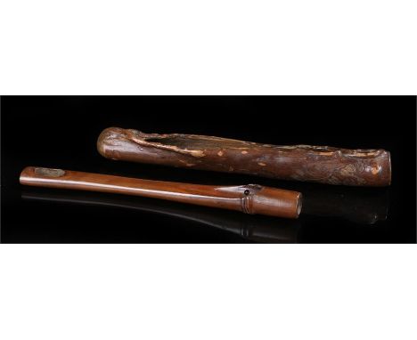 Two Meiji Senryuzutsu type pipe cases the first carved to represent bamboo the second as a log carved with flowers and an ins