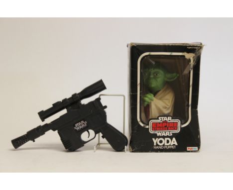 Palitoy: A Star Wars Empire Strikes back "Yoda" hand puppet (boxed) together with a Kenner Star Wars gun. (2)