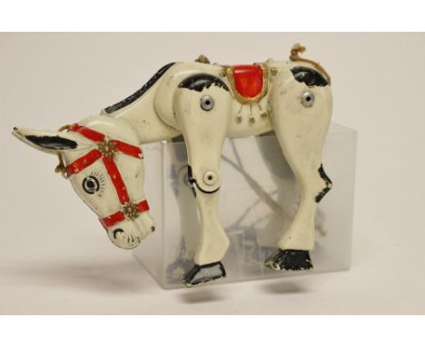 An unboxed and playworn Moko Lesney "Muffin the Mule" puppet, painted tinplate.