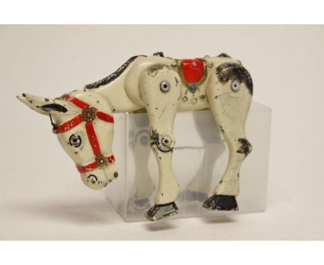 An unboxed and playworn Moko Lesney "Muffin the Mule" puppet, painted tinplate.