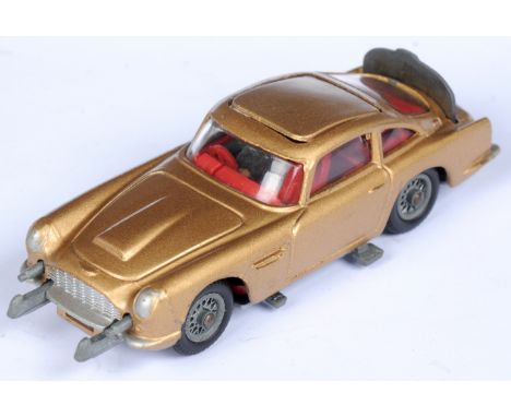 Corgi Toys 261 "James Bond" Aston Martin DB5 Taken From The Film "Goldfinger" - Gold body, red interior with "James Bond" fig