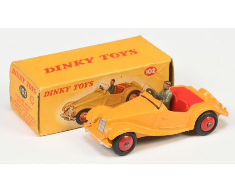 Dinky Toys 102 MG Midget Sports car - Yellow body, red interior and rigid hubs, figure driver and silver trim - Good Plus in 