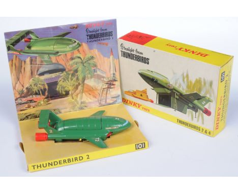 Dinky Toys 101 "Thunderbirds" Thunderbird 2 (1st issue) - Green body, yellow legs, red and chrome rear thrusters, complete wi