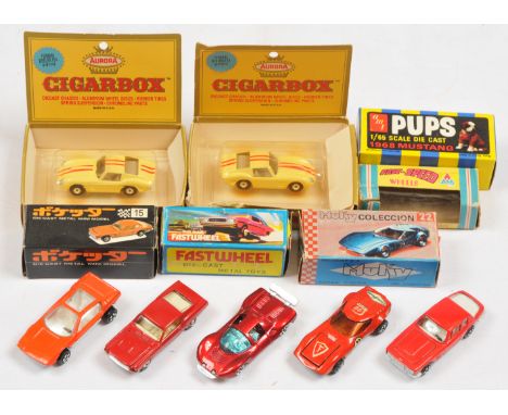 Group Of 7 small scale Issues To include - AMT Ford Mustang - Red, Tintoys (Fast-Speed) Ferrari - Metallic Red, 2 x Aurora Fe