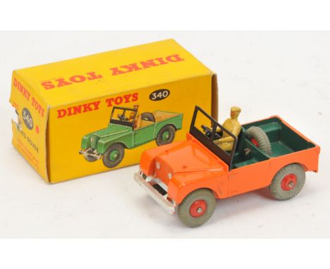 Dinky Toys 340 Land Rover - Burnt Orange, Dark green interior, light tan interior, silver trim and red rigid hubs with grey t