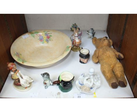 SECTION 23. A collection of assorted ceramics, including a Hummel figure, pair of Goebel cats, Sylvac bunnies, Doulton miniat