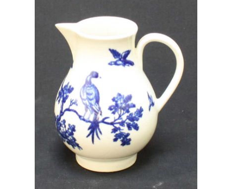 An 18th century Worcester sparrow beak jug decorated in underglaze blue in the ';Bird in a Tree,' pattern, crescent mark to b