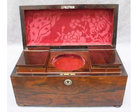 A 19th century rosewood tea caddy of plain rectangular form, enclosed two rosewood tea canisters with hinged cover, mixing re