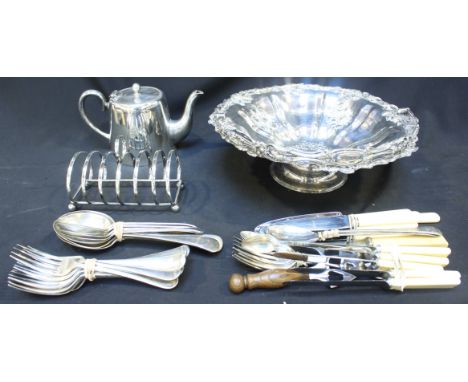 A quantity of assorted silver plated items including a large handled fruit basket, teapot and toast rack, plus a variety of p