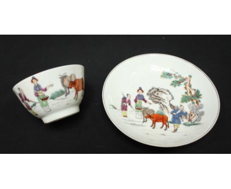 An 18th century  Worcester transfer printed and painted tea bowl and saucer in the 'Red Bull' pattern, tea bowl 7cm diam, sau