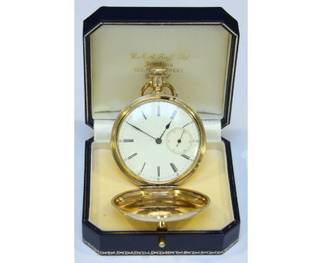 A full hunter pocket watch, the white enamel dial with Roman numerals denoting hours and subsidiary seconds dial. Case is mar