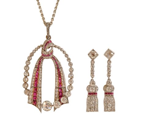 A ruby and diamond pendant and earrings, of tassel design with lines of calibre cut rubies, in white gold, fully articulated,