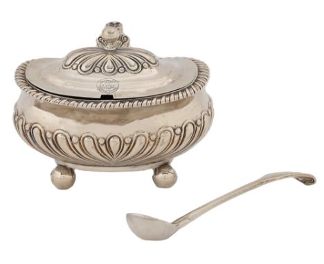 A George IV gadrooned silver mustard pot, ball feet, blue glass liner, 80mm h, marks rubbed, London 1820 and a Victorian silv