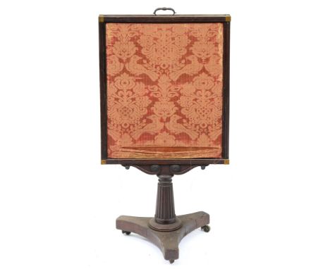 An early Victorian mahogany cheval firescreen, on fluted pillar and tripartite base with brass castors, 110cm h Basically com