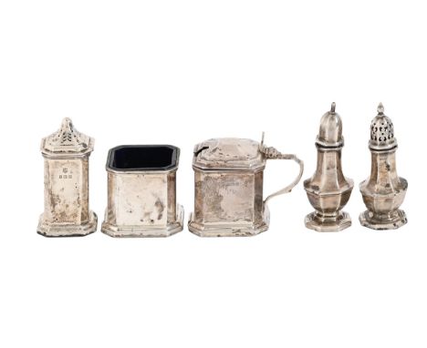 A George VI three-piece silver condiment set, pepperettes 66mm h, by Barker Brothers (Silver) Ltd, Birmingham 1951 and a pair
