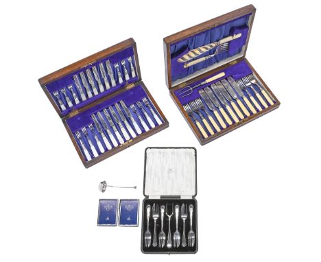A set of six EPNS cake forks and a serving fork,&nbsp; early 20th c, cased, a set of twelve mother of pearl hafted EPNS desse