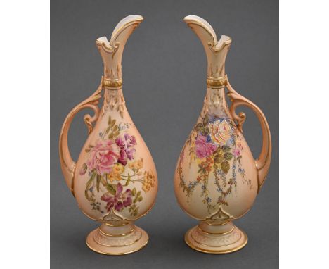 Two Royal Worcester ewers, 1909 and 1910, printed and painted with wild flowers, one heightened in raised enamels, on a shade
