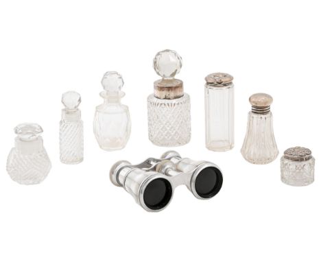 A pair of French mother of pearl and plated&nbsp; opera glasses in red velvet bag with drawstrings, early 20th c and various 