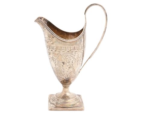 A George III bright cut and engraved silver cream jug, of helmet shape with reeded handle and beaded rim, 16cm h, by Charles 