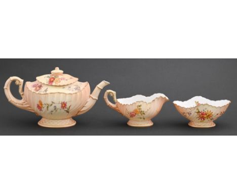 A Royal Worcester shell shaped tea service, 1895, printed and painted with wild flowers on a shaded apricot ground, teapot an