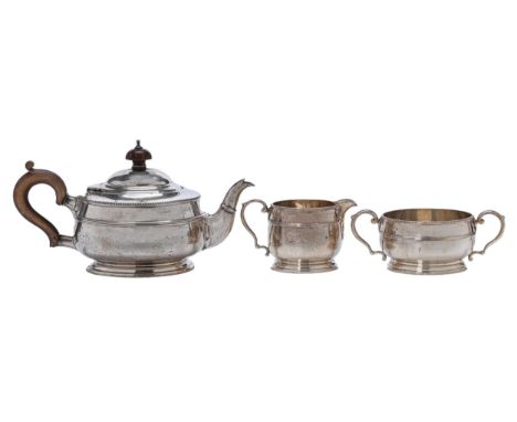 A George V silver tea service, with reeded girdle and beaded rim, teapot 12cm h, by The Alexander Clark Mfg Co Ltd, Birmingha